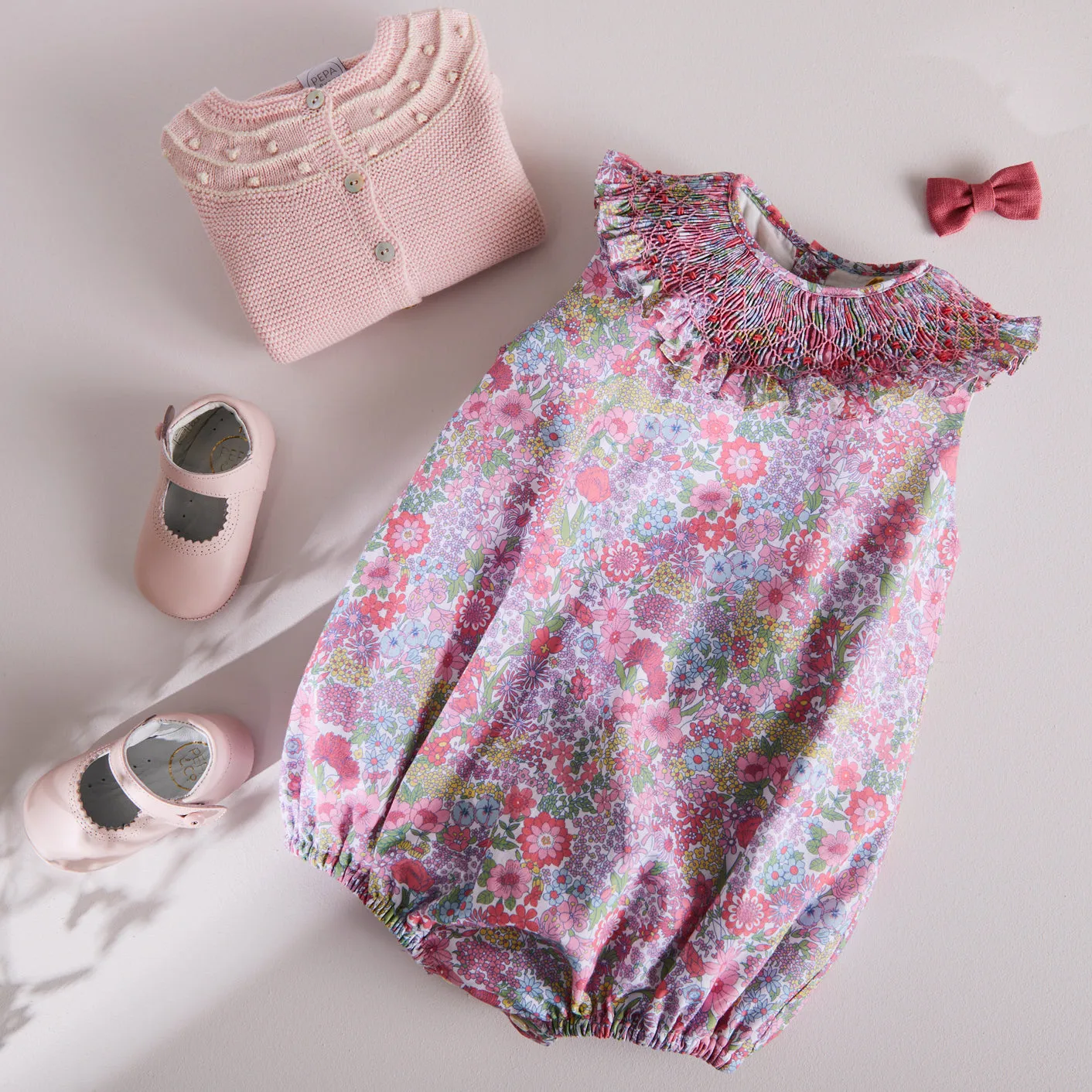 Floral Print Hand Smocked Romper in Pink (3-18mths)